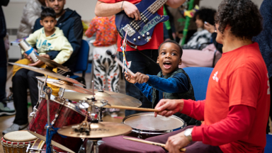 children and adults play together